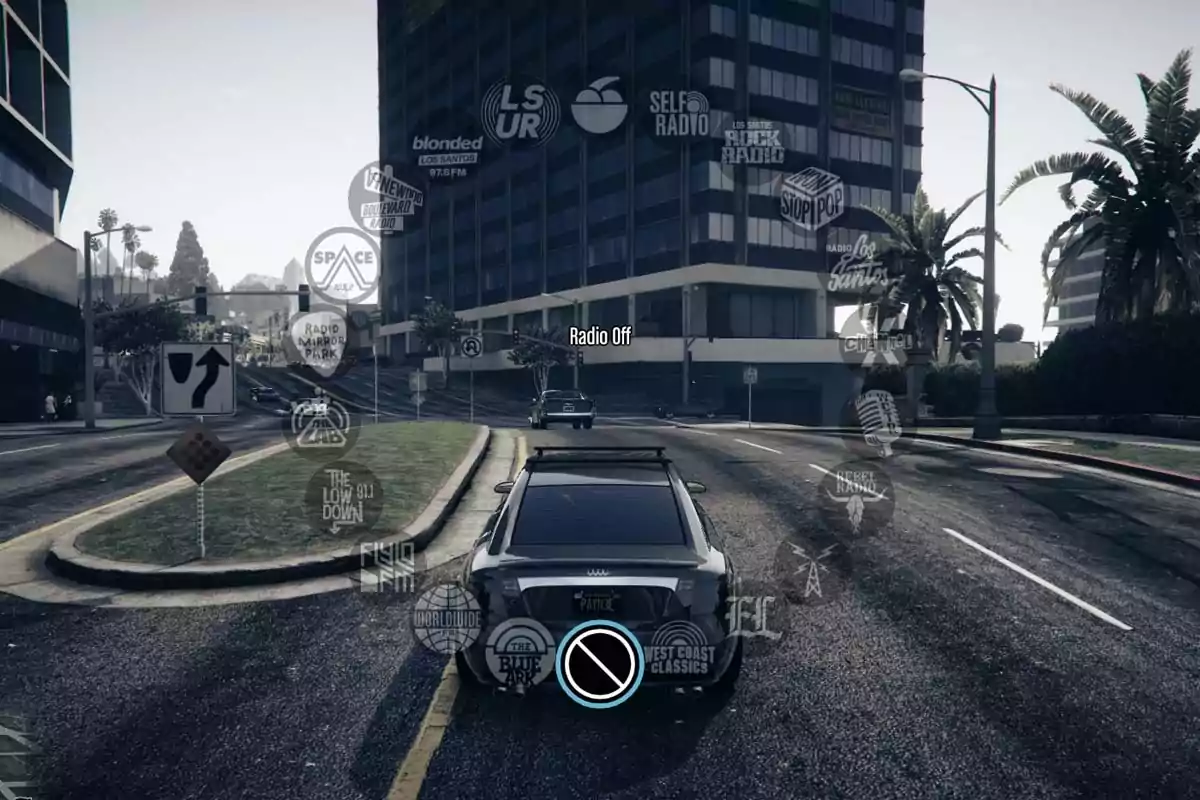 A black car is stopped on a city street inside a video game, with the radio station selection menu visible on the screen and the radio off option selected. A black car is stopped on a city street inside a video game, with the radio station selection menu visible on the screen and the radio off option selected.