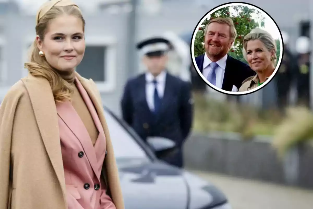 Una mujer joven con un abrigo beige y traje rosa sonríe mientras está de pie al aire libre, con un coche y una persona uniformada desenfocada al fondo; en la esquina superior derecha hay un recuadro con la imagen de un hombre y una mujer sonriendo.