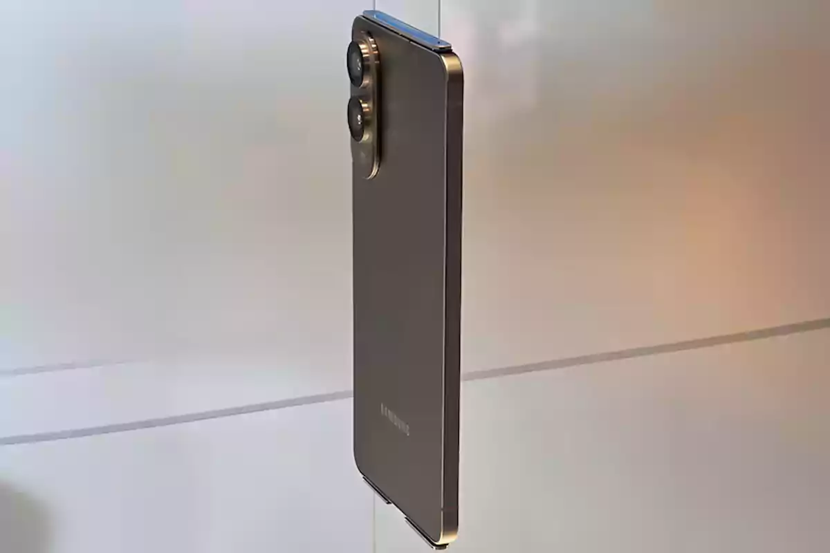 A profile smartphone with two rear cameras on a neutral background. A profile smartphone with two rear cameras on a neutral background.