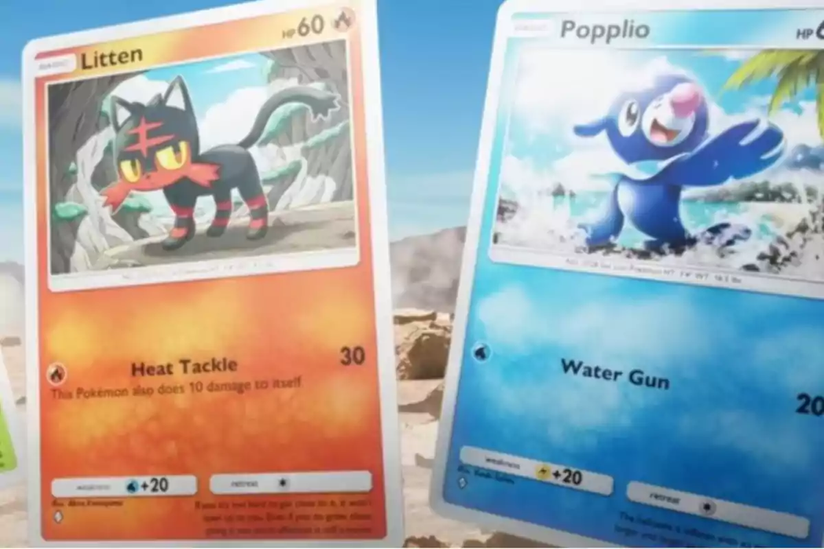 Dos cartas de Pokémon, una de Litten con fondo naranja y otra de Popplio con fondo azul, se muestran en un entorno al aire libre. Dos cartas de Pokémon, una de Litten con fondo naranja y otra de Popplio con fondo azul, se muestran en un entorno al aire libre.
