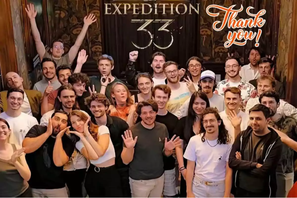 Group of smiling people posing together indoors with the phrases Expedition 33 and Thank you at the top