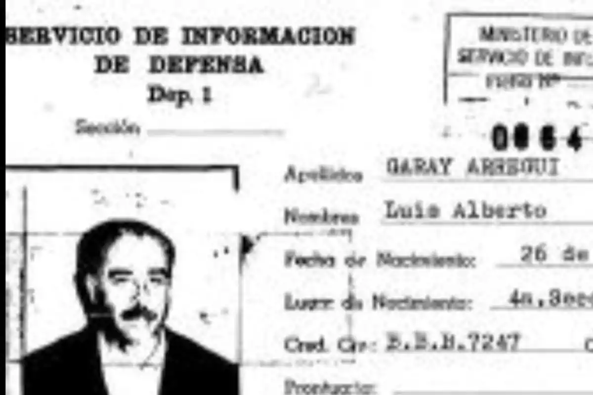 Official black and white document with a photograph of a man and visible personal information in text. Official black and white document with a photograph of a man and visible personal information in text.