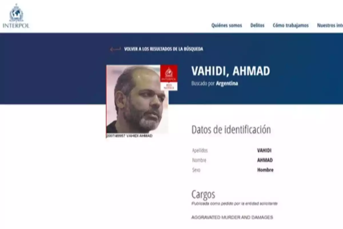 Interpol page showing the wanted notice for Ahmad Vahidi requested by Argentina, with his photo and identification details alongside the charges filed.